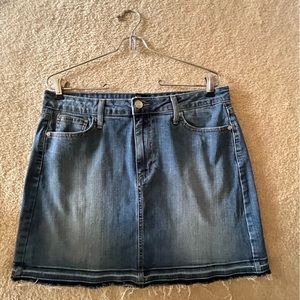 Just black brand. Size Large. Denim with pockets, frayed bottom.